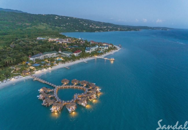 Sandals South Coast- Whitehouse, Jamaica a view of over the water cabanas and sandals south coast in jamaica