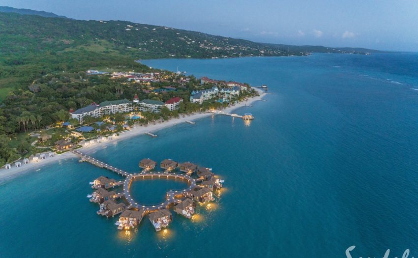 Sandals South Coast- Whitehouse, Jamaica a view of over the water cabanas and sandals south coast in jamaica