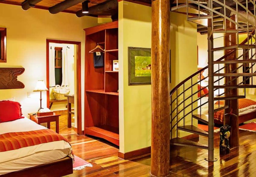 a look inside the bedroom in the orchard villa at chaa creek