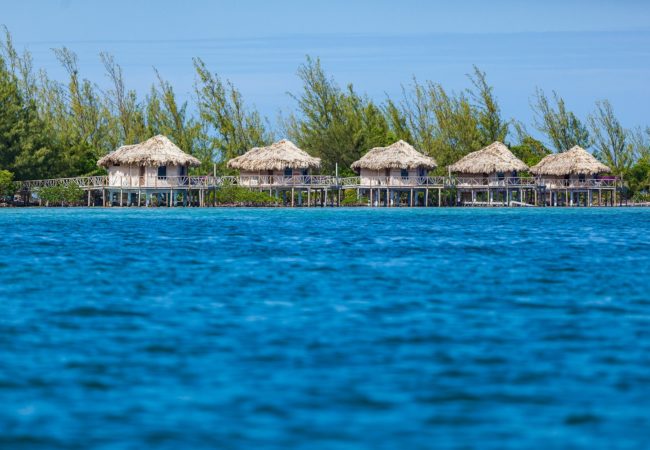 thatch caye island resorts, belize over the water cabanas at thatch caye private island belize