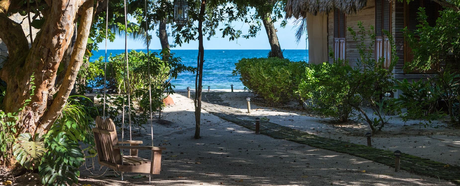 beach with views of the caribbean at turtle inn in belize