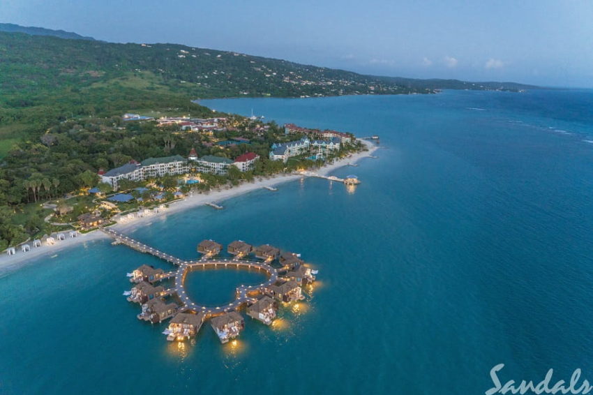 aerial view of the over the water bungalow and suites at sandals south coast in jamaica