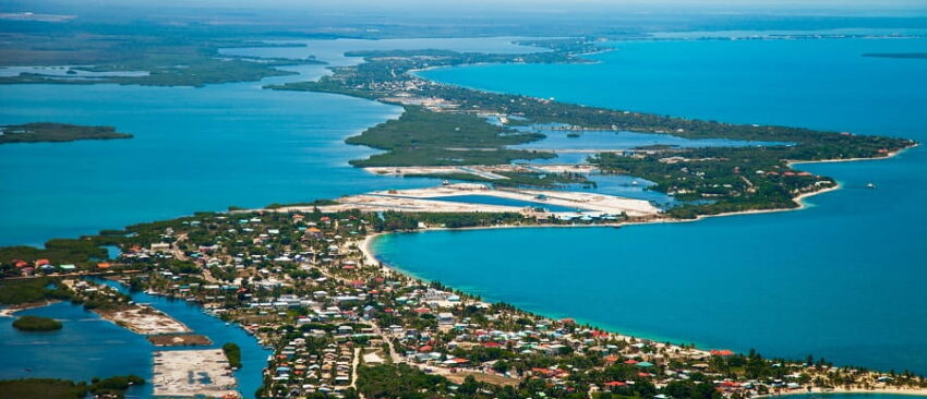placencia peninsula, a belize beach vacation destination ariel view of the placencia village in southern belize