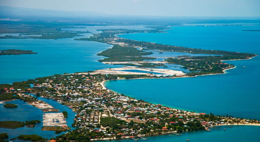 placencia peninsula, a belize beach vacation destination ariel view of the placencia village in southern belize