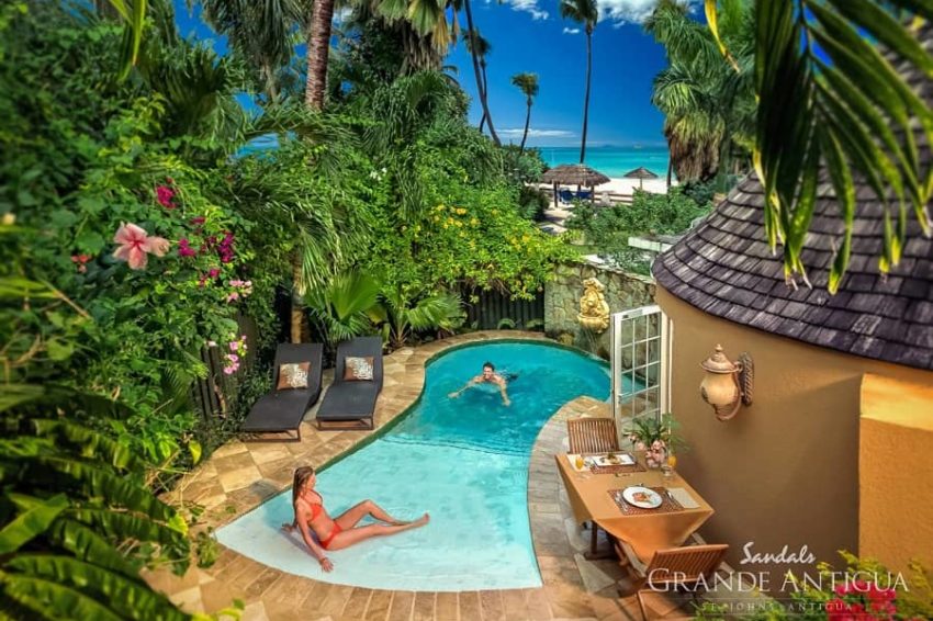 guests enjoying the private pool at the Caribbean Honeymoon Butler Rondoval with Private Pool Sanctuary at sandals antigua
